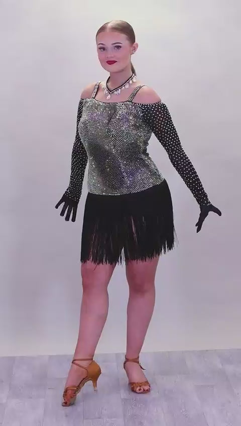 250 Black fringed skirt Latin dress. Solid AB stoning to bodice with cold shoulder black mesh stoned fingered sleeves