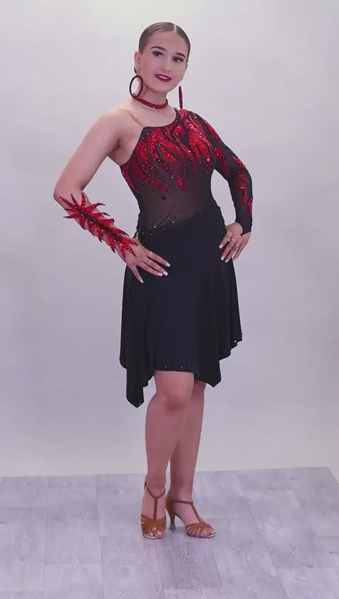 011L Stunning Black & Red Competition Latin  Dance Dress. Black mesh over Tan Lycra bodysuit. Stoned in Light Siam & Jet with decorative wrist/arm cuffs. Full black floaty skirts. Comes with optional black belt.