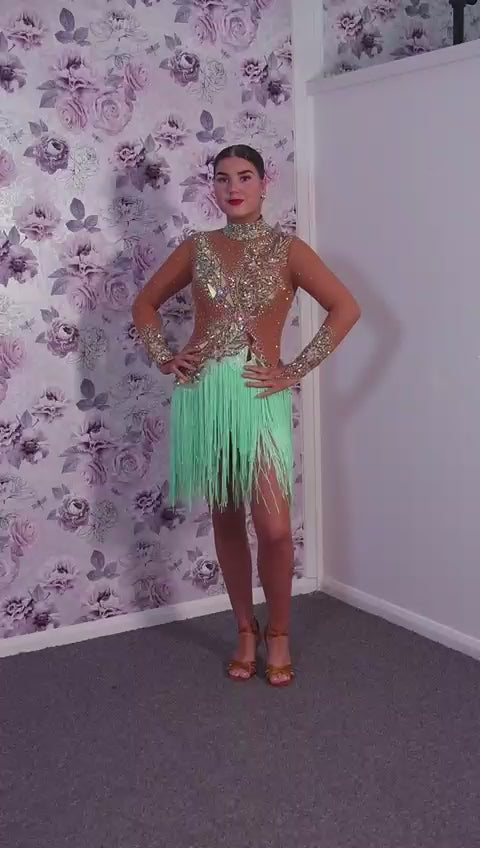 190 Tan mesh & mint Green High back Latin dress. Decorated with gold mirrors & AB stones.