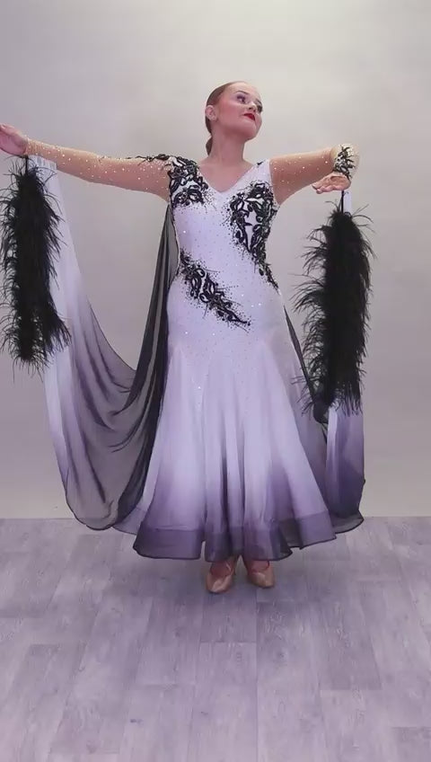 048 White Ballroom Dress with Black lace detailing to the upper chest & sides. Comes with x2 cuffs decorated with appliqué. Stoned in AB and Jet