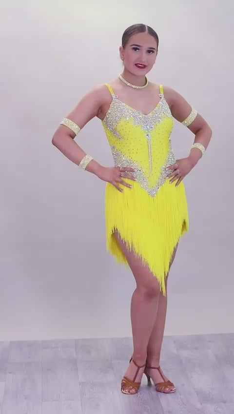 010L Flo Yellow Competition Latin Dance Dress. Heavily stoned in AB & Citrine with full fringed skirt.